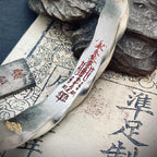 Macro shot focusing on the inner engraved Wealth Attraction Mantra, attracting benefactors, opportunities, and financial prosperity.