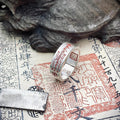 front view of wealth attraction ring engraved with talisman for attracting money and financial opportunities