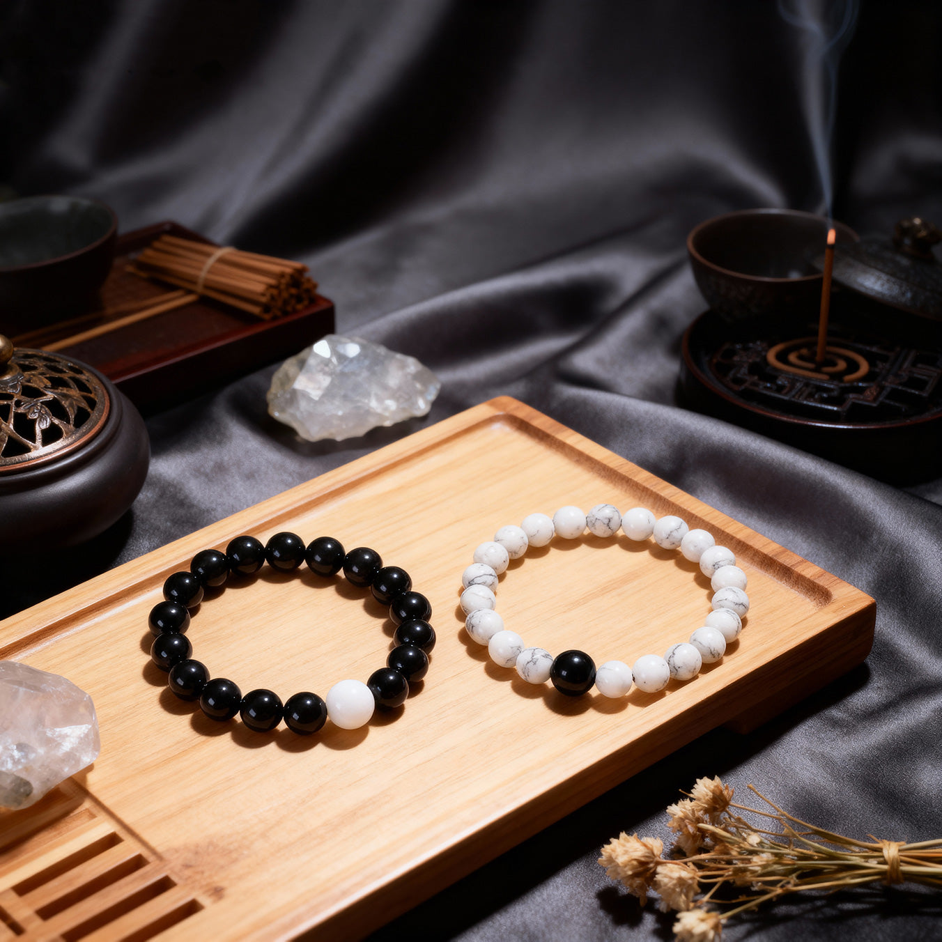 Taoist KaiGuang yin yang couple bracelet gift set — black obsidian map stone his and hers matching bracelet flat lay display
